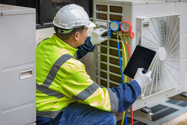 Professional Hvac technician working in Wyoming, DE